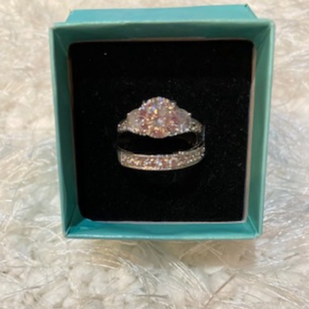 Sterling Silver wedding set.